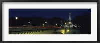 Framed Bridge with a monument lit up at night, Friedensengel, Munich, Bavaria, Germany