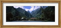 Framed Mountains and buildings on the coast, Tahiti, French Polynesia