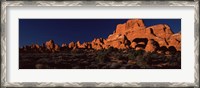 Framed Rock formations on an arid landscape, Arches National Park, Moab, Grand County, Utah, USA