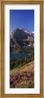 Framed Lake near a mountain, US Glacier National Park, Montana, USA