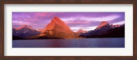Framed Lake with mountains at dusk, Swiftcurrent Lake, Many Glacier, US Glacier National Park, Montana, USA