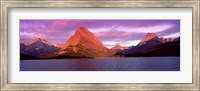 Framed Lake with mountains at dusk, Swiftcurrent Lake, Many Glacier, US Glacier National Park, Montana, USA