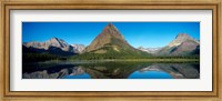 Framed Reflection of mountains in Swiftcurrent Lake, Many Glacier, US Glacier National Park, Montana, USA