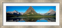 Framed Reflection of mountains in Swiftcurrent Lake, Many Glacier, US Glacier National Park, Montana, USA