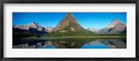 Framed Reflection of mountains in Swiftcurrent Lake, Many Glacier, US Glacier National Park, Montana, USA