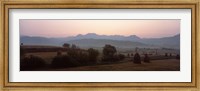 Framed Agricultural field with a mountain range in the background, Transylvania, Romania