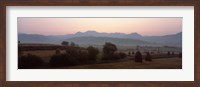 Framed Agricultural field with a mountain range in the background, Transylvania, Romania