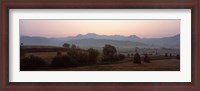 Framed Agricultural field with a mountain range in the background, Transylvania, Romania