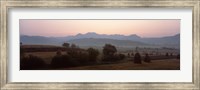 Framed Agricultural field with a mountain range in the background, Transylvania, Romania