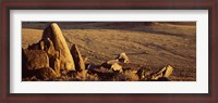 Framed Rocks in a desert, overview of tourist vehicle, Namibia