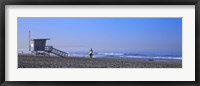 Framed Rear view of a surfer on the beach, Santa Monica, Los Angeles County, California, USA