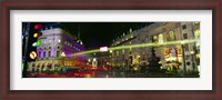 Framed Buildings lit up at night, Piccadilly Circus, London, England