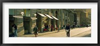 Framed Cyclists and pedestrians on a street, City Center, Florence, Tuscany, Italy