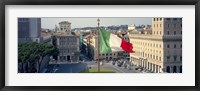 Framed Italian flag fluttering with city in the background, Piazza Venezia, Vittorio Emmanuel II Monument, Rome, Italy