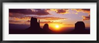 Framed Silhouette of buttes at sunset, Monument Valley, Utah