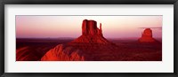 Framed East Mitten and West Mitten buttes at sunset, Monument Valley, Utah