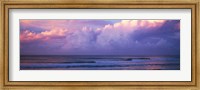 Framed Clouds over the sea at sunset