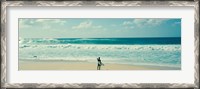 Framed Surfer standing on the beach, North Shore, Oahu, Hawaii