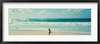 Framed Surfer standing on the beach, North Shore, Oahu, Hawaii