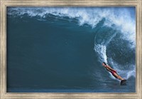 Framed Man surfing in the sea