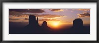 Framed Silhouette of buttes at sunset, The Mittens, Monument Valley Tribal Park, Monument Valley, Utah, USA