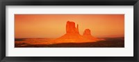 Framed Buttes at sunrise, The Mittens, Monument Valley Tribal Park, Monument Valley, Utah, USA