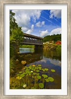 Framed Covered bridge across a river, Vermont, USA