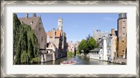 Framed Tourboat in a canal, Bruges, West Flanders, Belgium