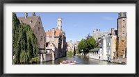 Framed Tourboat in a canal, Bruges, West Flanders, Belgium