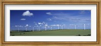 Framed Wind turbines in a farm, Newlyn Downs, Cornwall, England