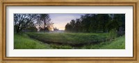 Framed Green field with university building in the background, King's College, Cambridge, Cambridgeshire, England