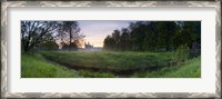 Framed Green field with university building in the background, King's College, Cambridge, Cambridgeshire, England