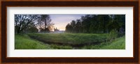 Framed Green field with university building in the background, King's College, Cambridge, Cambridgeshire, England