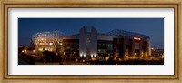 Framed Football stadium lit up at night, Old Trafford, Greater Manchester, England