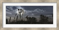 Framed Stork flying with baby in beak over moon