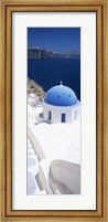 Framed High angle view of a church with blue dome, Oia, Santorini, Cyclades Islands, Greece