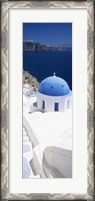 Framed High angle view of a church with blue dome, Oia, Santorini, Cyclades Islands, Greece