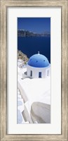 Framed High angle view of a church with blue dome, Oia, Santorini, Cyclades Islands, Greece