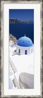 Framed High angle view of a church with blue dome, Oia, Santorini, Cyclades Islands, Greece