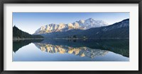 Framed Wetterstein Mountains and Zugspitze Mountain reflecting in Lake Eibsee, Bavaria, Germany