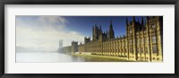 Framed Government building at the waterfront, Houses Of Parliament, Thames River, London, England