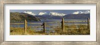 Framed Fence in front of a lake with mountains in the background, Lake General Carrera, Andes, Patagonia, Chile