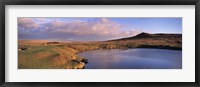 Framed Pond and warm evening light at Sharpitor, Dartmoor, Devon, England