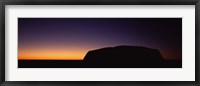 Framed Silhouette of Ayers Rock formations on a landscape, Uluru-Kata Tjuta National Park, Northern Territory, Australia