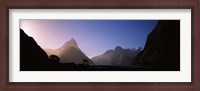 Framed Mountain range at water's edge, Milford Sound, Fiordland National Park, South Island, New Zealand