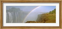 Framed Rainbow form in the spray created by the water cascading over the Victoria Falls, Zimbabwe