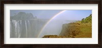 Framed Rainbow form in the spray created by the water cascading over the Victoria Falls, Zimbabwe