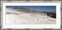 Framed Tourists enjoying the hot springs and travertine pool, Pamukkale, Denizli Province, Turkey