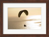 Framed Silhouette of a paraglider flying over an ocean, Pacific Ocean, San Diego, California, USA