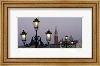 Framed Lampposts lit up at dusk with building in the background, San Giorgio Maggiore, Venice, Italy